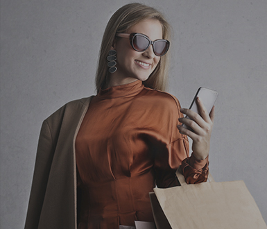 Woman modeling embroidered apparel